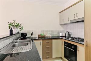 Poolside Paradise Cairns - 9 Pools BBQ & Gym