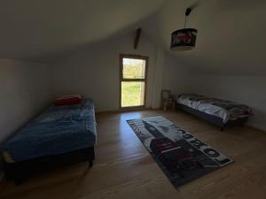 Maisons de vacances Location La Grange de Routge - 4 etoiles : photos des chambres