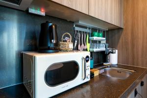 Residence with a beautiful high-rise view of Infinity Pool