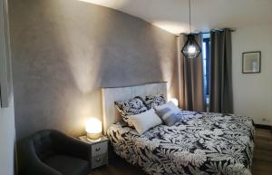 Appartements Appartement sous les remparts : photos des chambres
