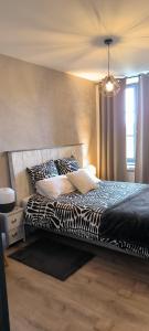 Appartements Appartement sous les remparts : photos des chambres