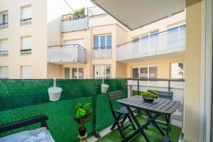 Appartements Le Cocotier Athisien : photos des chambres