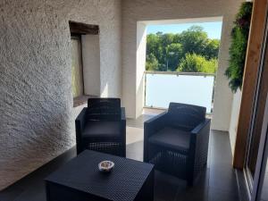 Appartements L'instant des Plaisirs : photos des chambres
