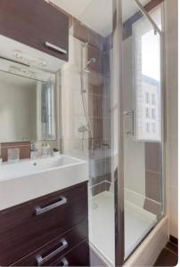 Appartements L-ideal a 2 pas de Paris et du metro dhhimmo : photos des chambres