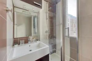 Appartements L-ideal a 2 pas de Paris et du metro dhhimmo : photos des chambres