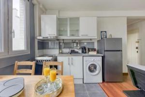 Appartements L-ideal a 2 pas de Paris et du metro dhhimmo : photos des chambres