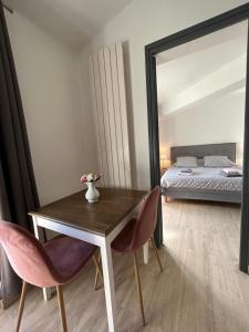 Appartements La maison du Baron : photos des chambres