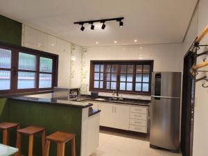 CASA PROXIMA A PRAIA GRANDE E TENORIO