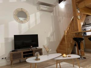 Appartements Loft Boheme et Cosy : photos des chambres