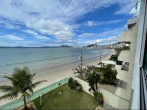 Ap pé na areia itapema frente mar