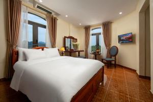 Phòng Đôi hoặc Hai Giường Đơn Loại Sang (Deluxe Double or Twin Room)