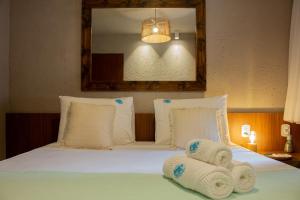 3 Suítes a 50m da Praia do Patacho, com Piscina