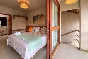 3 Suítes a 50m da Praia do Patacho, com Piscina