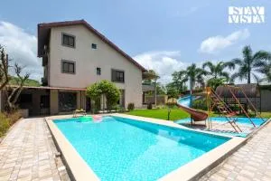 StayVista at Dusk by the Hills with Heated Pool - Malavli