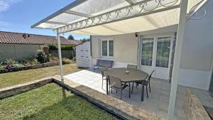 Maisons de vacances Le magnolia : photos des chambres