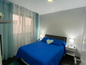 Apartamento de playa familiar, piscina y garaje.