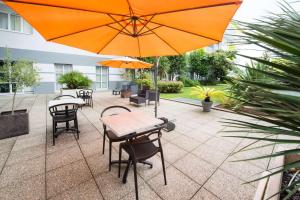 Hotels Comfort Aparthotel Saint-Nazaire Les Portes de l Ocean : photos des chambres
