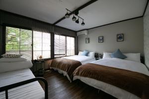 最大16名の広々ステイ新今宮駅4分動物園前駅すぐ大阪観光に超便利