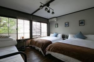 最大16名の広々ステイ新今宮駅4分動物園前駅すぐ大阪観光に超便利