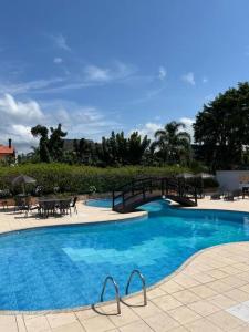 Apto aconchegante e pé na areia