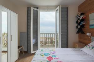Maisons de vacances Maison face mer acces direct plage : photos des chambres