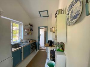 Charming Thatched-Roof Cottage From 1947