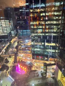 Cozi Uptown 1br suite Mitsukoshi Mall BGC