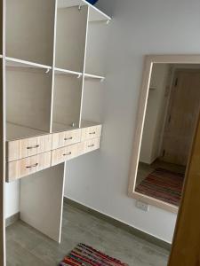 Studio with Private Door Front Seating Area at La Hacienda