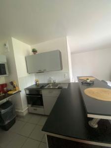 Appartements La Cachette Ludique : photos des chambres