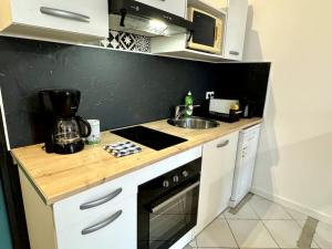 Appartements Joli studio centre-ville : photos des chambres