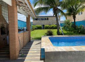 Casa com piscina Próxima do centro e Praia - Até 20 hóspedes