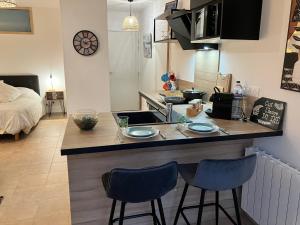 Appartements Le Studio : photos des chambres