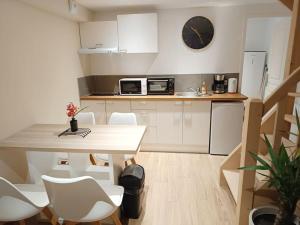 Appartements Le petit cocon : photos des chambres