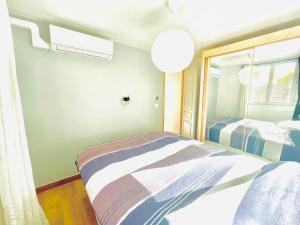 Appartements SECRET GARDEN parking hyper centre & calme : photos des chambres
