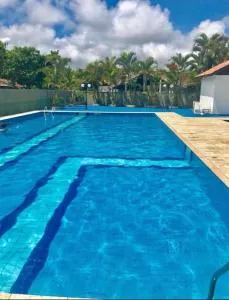 Casa condomínio com piscina - Balneário Praia do Leste
