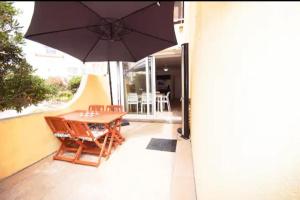 T2 Rez de jardin accès direct plage