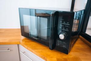 Appartements LE PETIT VOLTAIRE - Proche Centre Ville - Spacieux : photos des chambres