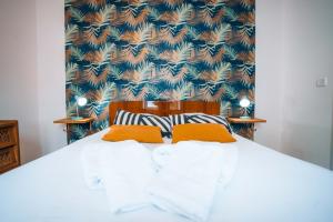 Appartements LES PETITS ROYS - Proche centre ville - Cosy : photos des chambres