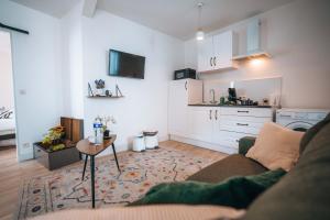 Appartements LES PETITS ROYS - Proche centre ville - Cosy : photos des chambres