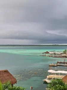 Casa Sirena - Habitaciones a orilla de la Laguna y Cenote Esmeralda - Cenote Azul