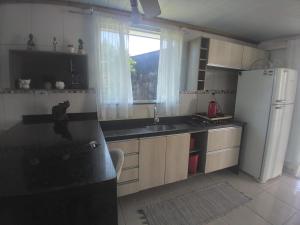 Casa pé na areia em Matinhos - uma quadra do mar