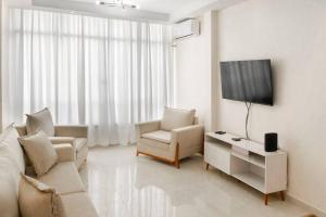 Apt Copacabana 1 quadra praia vista parcial mar