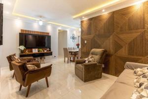 Apartamento moderno com piscina na praia do forte