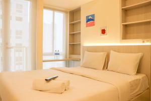 Nice and Homey Studio Tokyo Riverside PIK 2 Apartment By Travelio