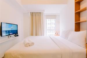 Modern Look and Comfy Studio Tokyo Riverside PIK 2 Apartment By Travelio