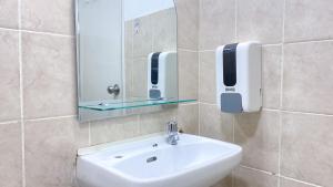 Cozy and Comfort Living 2BR Green Bay Pluit Apartment By Travelio