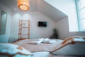 Appartements L-Evasion - Authentique & Chill - Premium : photos des chambres