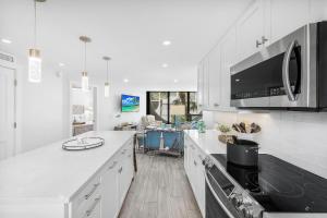 Cabana-style condo in Anglers Cove with pools and spas