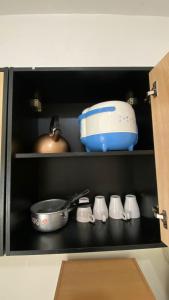 Minimalist and Homey Studio Green Bay Pluit Apartment By Travelio