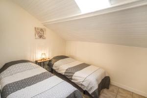 Sejours chez l'habitant Maison de ville NLR - 6 lits simples - BBQ - Proche Gare - grand Parking : photos des chambres